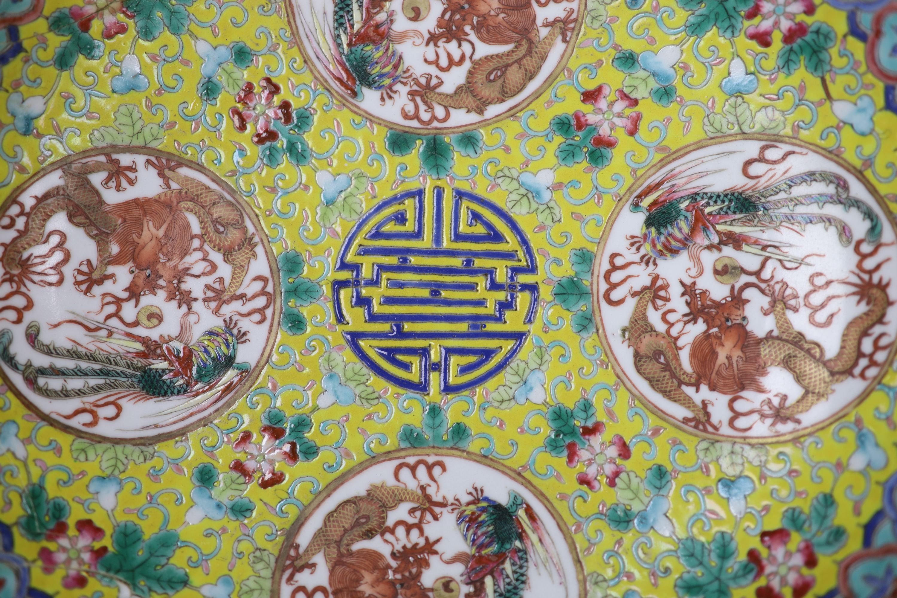 Two Chinese blue and white vases and a dish, together with a famille rose dish, tallest 28cm